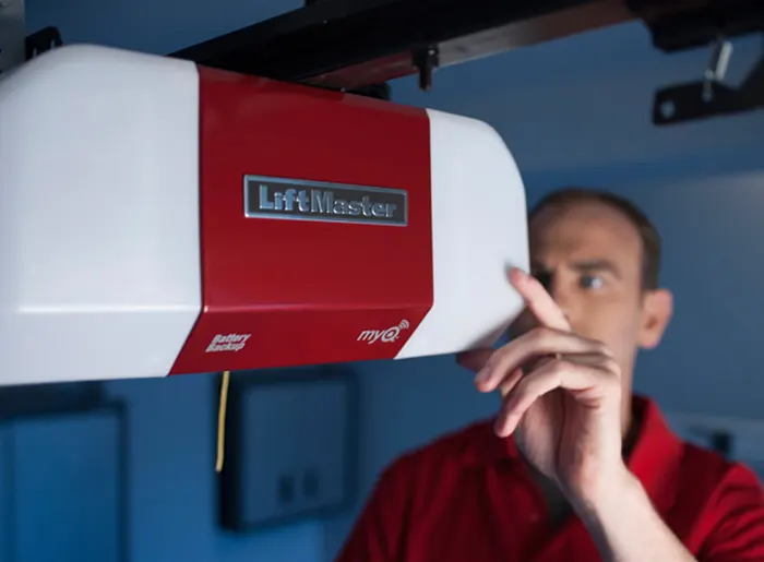 Technician repairing Garage Door opener