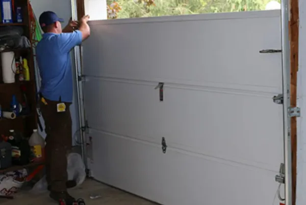 Replacing garage door rollers